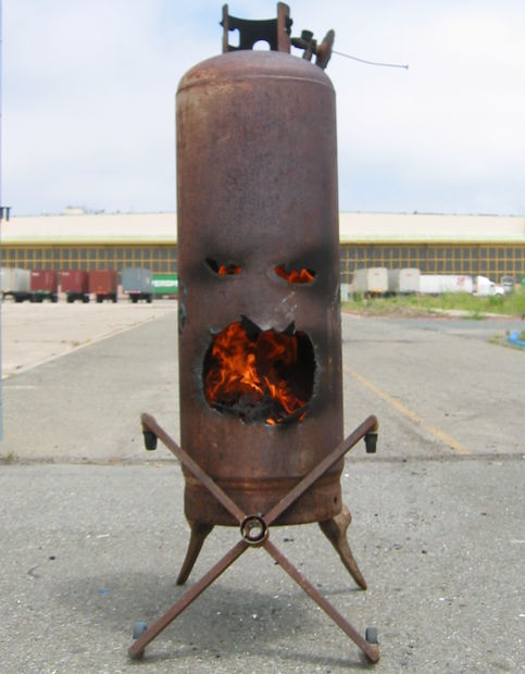 DIY Outdoor Fireplace Made From Old Propane Tank