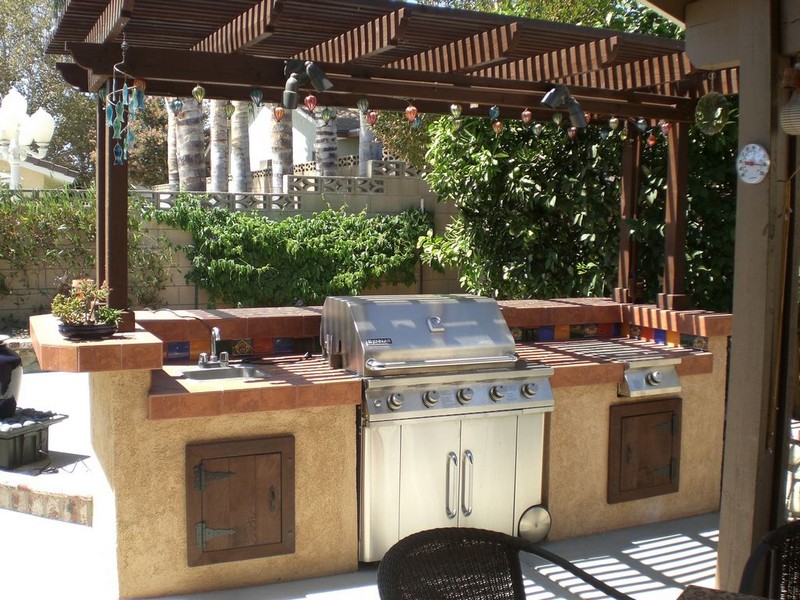 building an outdoor kitchen with a pergola overhead